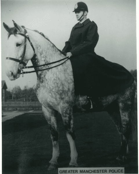 British Policeman in Mackintosh Riding Coat (From the British Fashion Council collection)